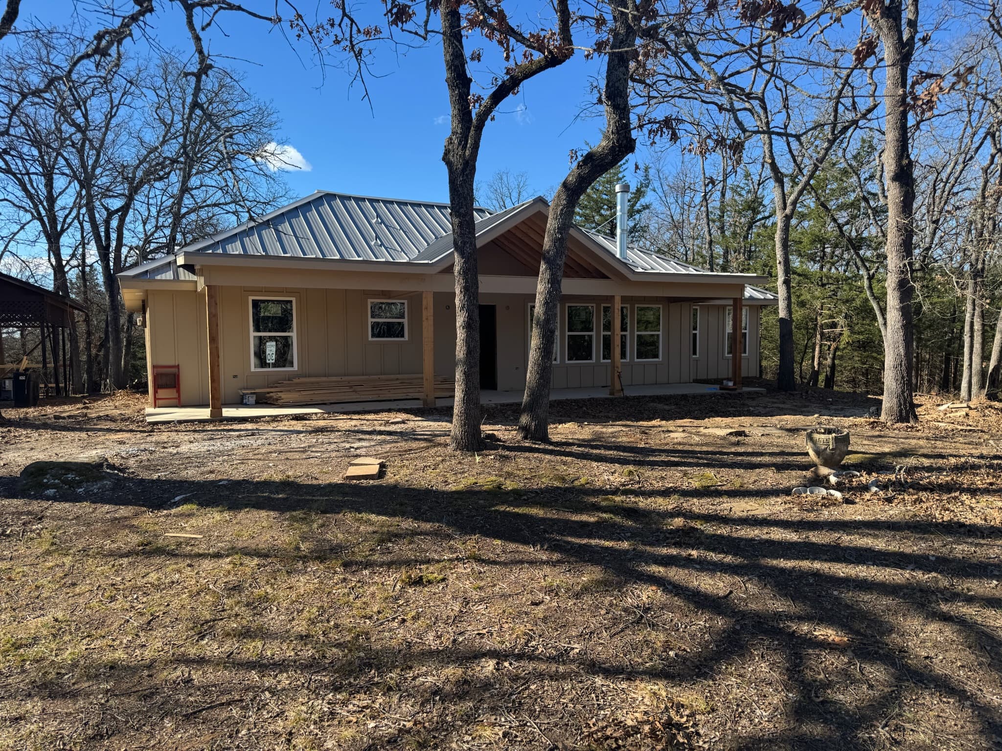 Timpanaro home after remodel — modern farmhouse with metal roof